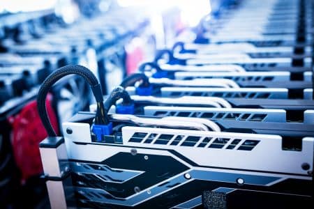 Rows of low-power GPUs, such as the NVIDIA RTX A400, are installed in a server rack and connected by cables, likely for use in computing or cryptocurrency mining.