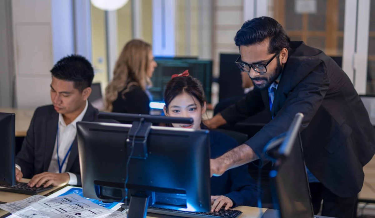 Group of programmers are coding at office. Business, Coding programs, AI applications, technology.