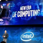 A man presents on stage at an Intel event, proudly holding the "2019 Intel Partner of the Year Award," with a backdrop reading "NEW ERA OF COMPUTING.