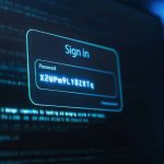 A computer screen displays a login interface with a "Sign in" prompt and a password field filled with random characters.